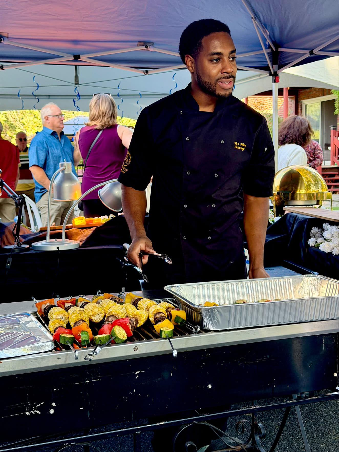 Chef Ty grilling at an event
